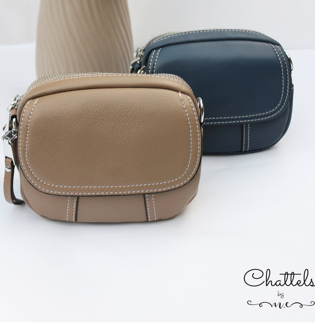 “Keva Mini Leather Crossbody bag” (Blue)